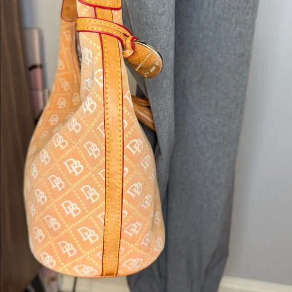 Dooney and Burke EUC. salmon color, canvas, swing style bag, key fob,storage - Picture 6 of 14